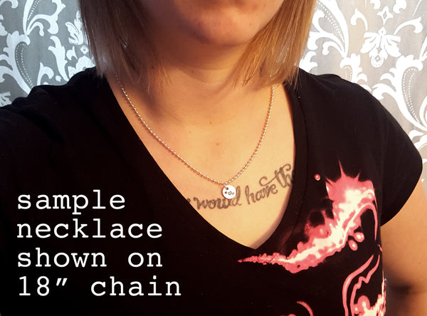 stamped coin punch out necklace